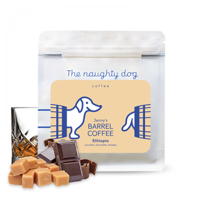 
“Jenny’s Barrel Coffee Ethiopia bag with caramel, chocolate, and whiskey flavor notes.”

More detailed option:

“The Naughty Dog Jenny’s Barrel Coffee Ethiopia packaging with caramel, chocolate, and whiskey ingredients displayed.”

E-commerce optimized:

“Ethiopian Jenny’s Barrel Coffee by The Naughty Dog, flavored with caramel, chocolate, and whiskey, shown in resealable bag.”
